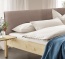 Massivholz Bett aus Zirbe mit hochwertigem Leder-Kopfteil Massivholz Bett aus Zirbe mit hochwertigem Leder-Kopfteil