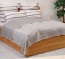 Wende-Decke als geschmackvolle Tagesdecke für Ihr Zuhause Wende-Tagesdecke über einem Bett in der Farbe grau in der Größe 220x250 cm