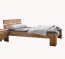 Jugendbett aus lebendig gemasertem Kernbuchenholz mit geölter Oberfläche Jugendbett aus lebendig gemasertem Kernbuchenholz mit geölter Oberfläche