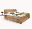 Schubkastenbett aus geöltem Massivholz mit warmer Ausstrahlung Schubkastenbett aus geöltem Massivholz mit warmer Ausstrahlung