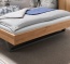 Schwebebett Granera mit hochwertigen Metallkufen für Schwebe-Optik Schwebebett Granera aus Kernbuche mit hochwertigen Metallkufen für Schwebe-Optik