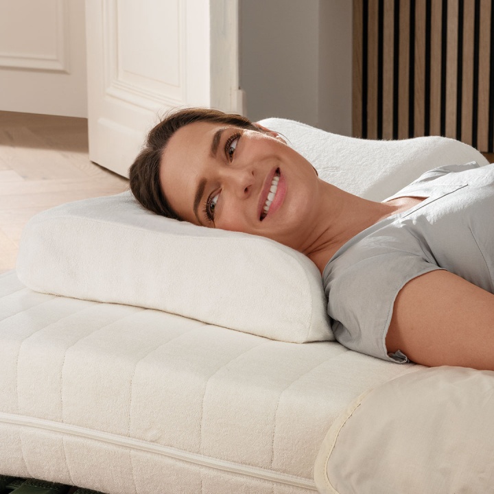 Ergonomisch geformtes Nackenstützkissen für entspannten Schlaf in jeder Lage Ergonomisch geformtes Nackenstützkissen für entspannten Schlaf in jeder Lage
