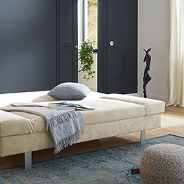 Ausgeklappt ein bequemes Doppelbett Ausgeklappt ein bequemes Doppelbett