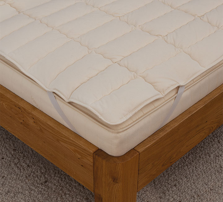 Hautsympathisches, anschmiegsames Unterbett aus Bio-Baumwolle Hautsympathisches, anschmiegsames Unterbett aus Bio-Baumwolle
