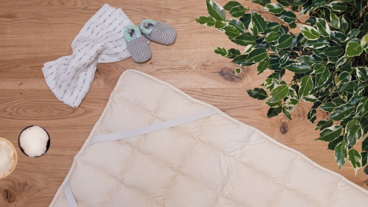 Waschbares Baby-Unterbett für das Gitterbett