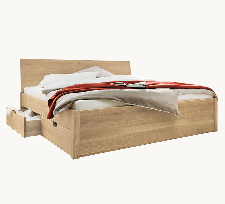 Puristisch gestaltetes Schubkastenbett Puristisch gestaltetes Schubkastenbett